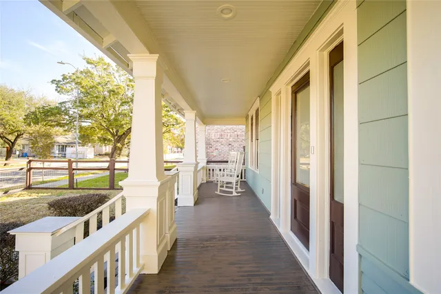 a view of a living room with a large window