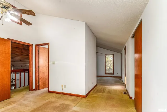 a view of an empty room with window