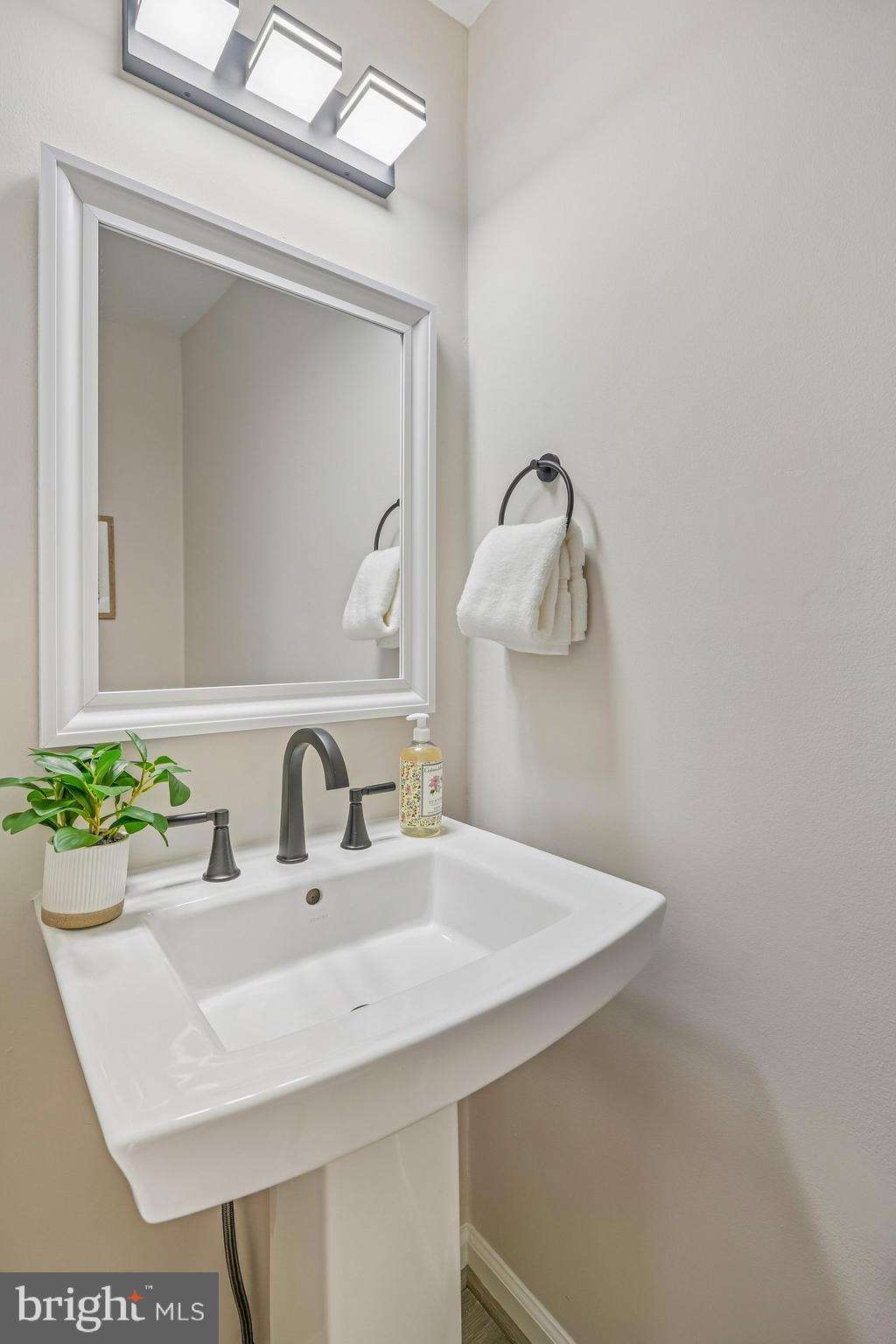 9955 Guilford Road Jessup, MD 20794 - Photo 12 of 45 Sleek bathroom with modern elegance.