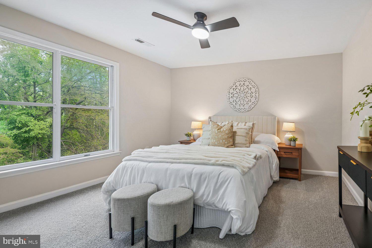 9955 Guilford Road Jessup, MD 20794 - Photo 14 of 45 Serene bedroom with nature views and light.
