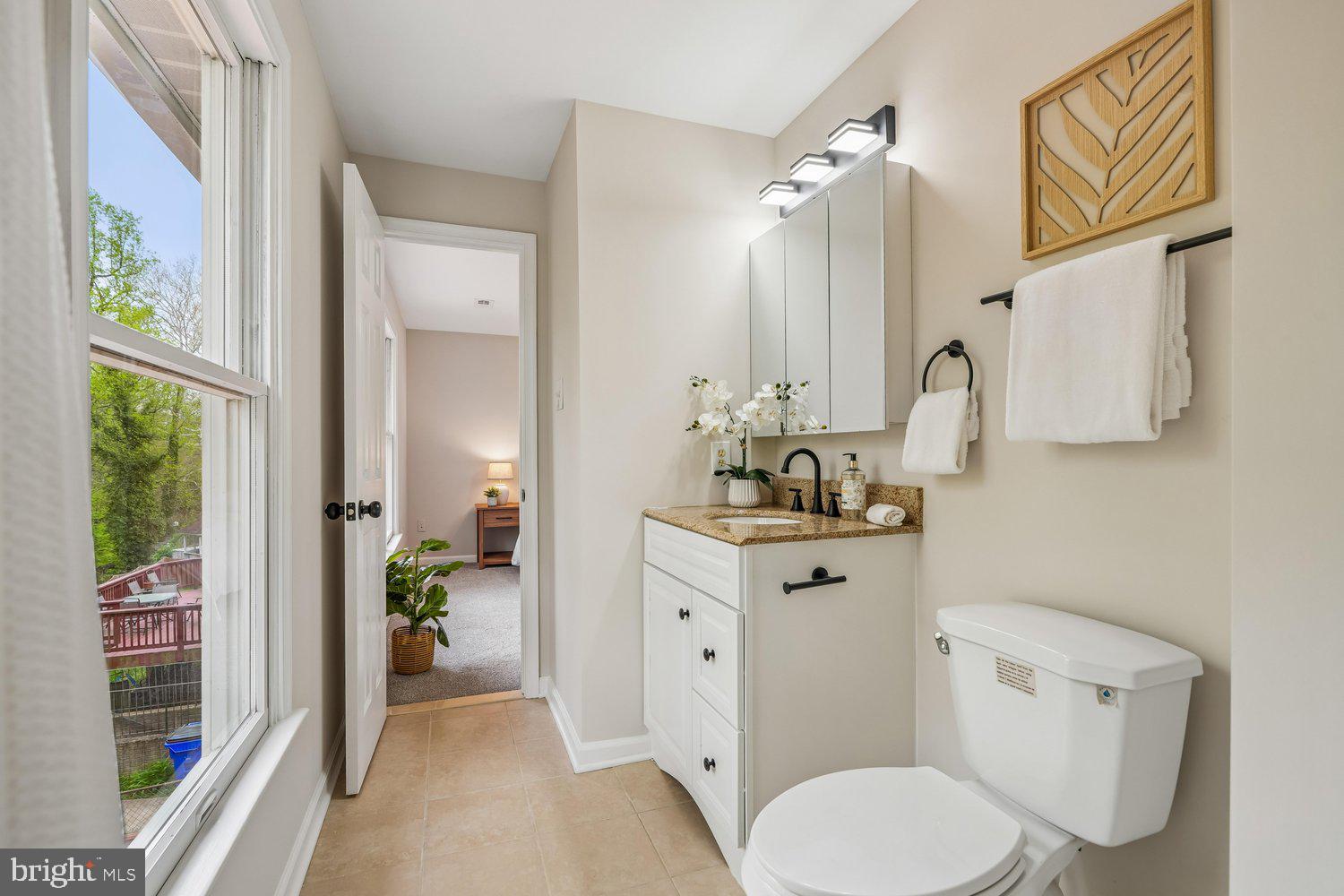 9955 Guilford Road Jessup, MD 20794 - Photo 18 of 45 Bright and inviting bathroom with modern touches.