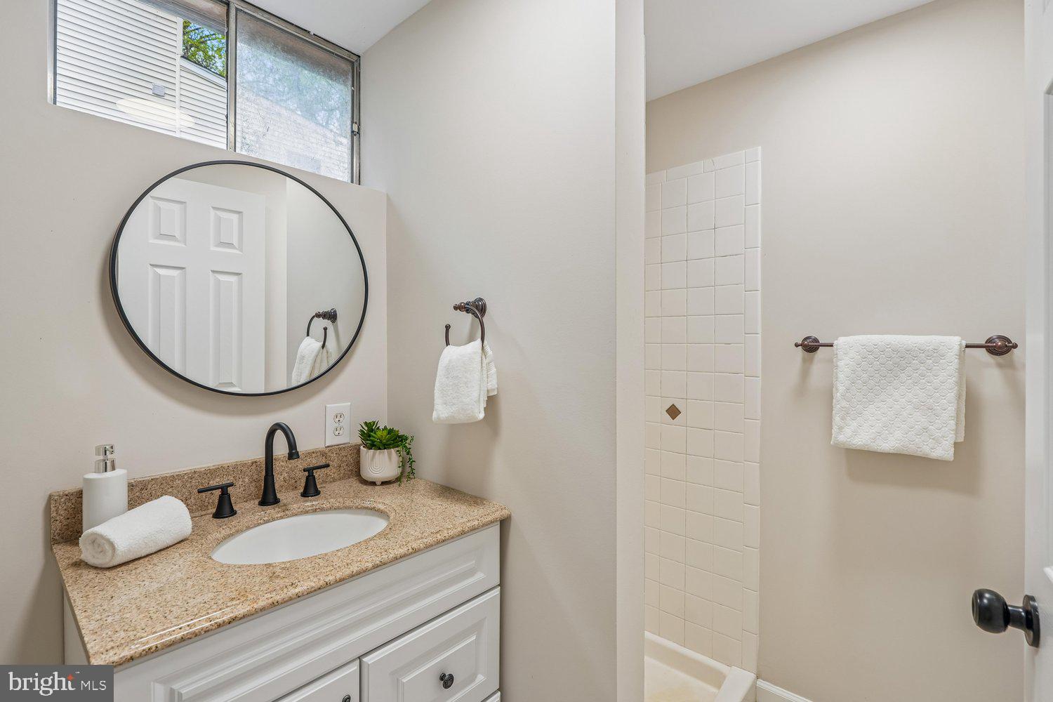 9955 Guilford Road Jessup, MD 20794 - Photo 29 of 45 Modern bathroom with elegant finishes.