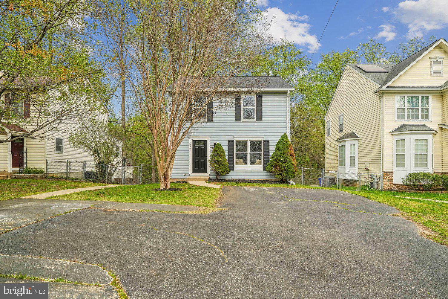 9955 Guilford Road Jessup, MD 20794 - Photo 40 of 45 Charming home nestled among lush greenery.