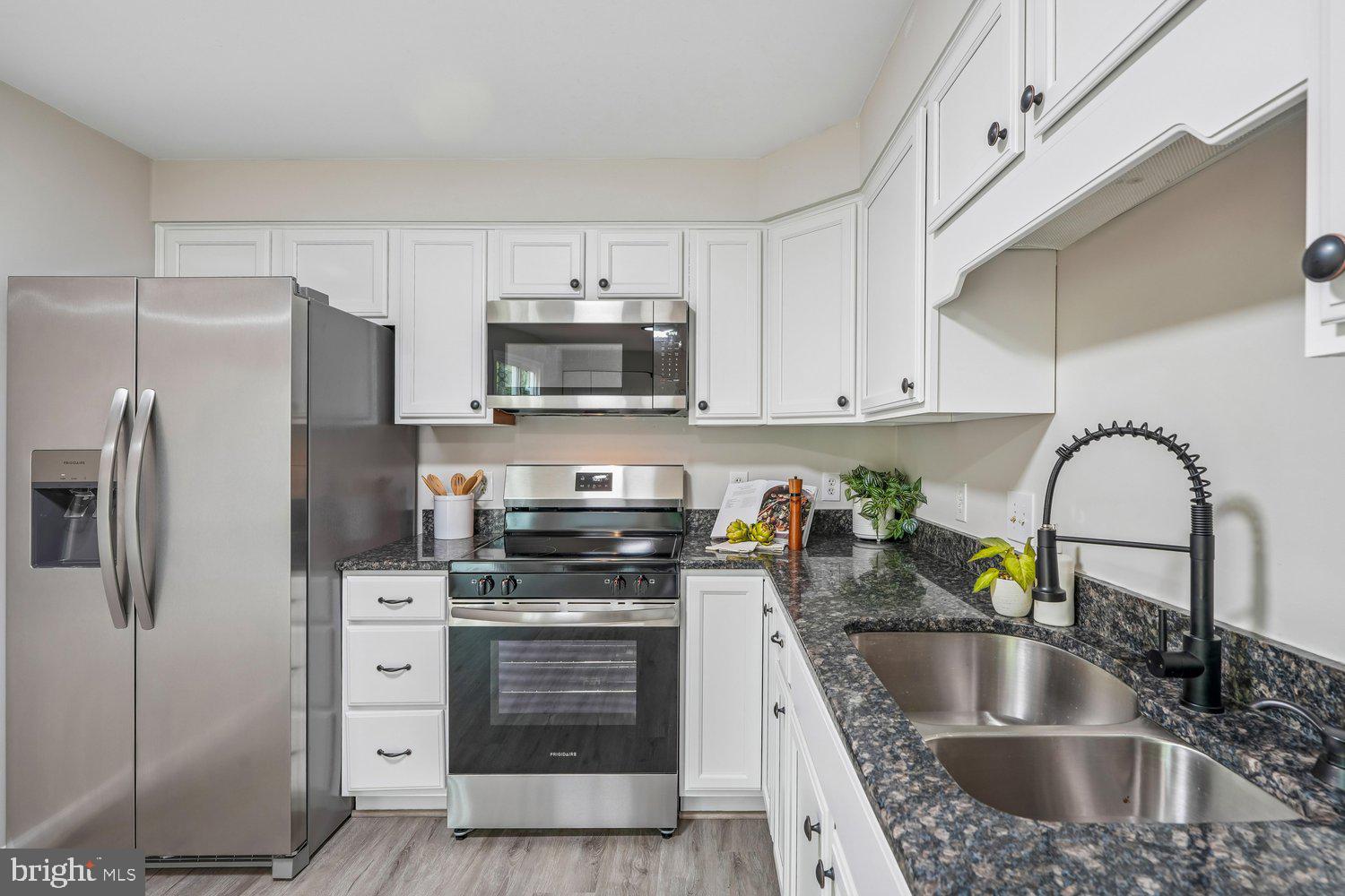 9955 Guilford Road Jessup, MD 20794 - Photo 6 of 45 Modern kitchen with sleek finishes.