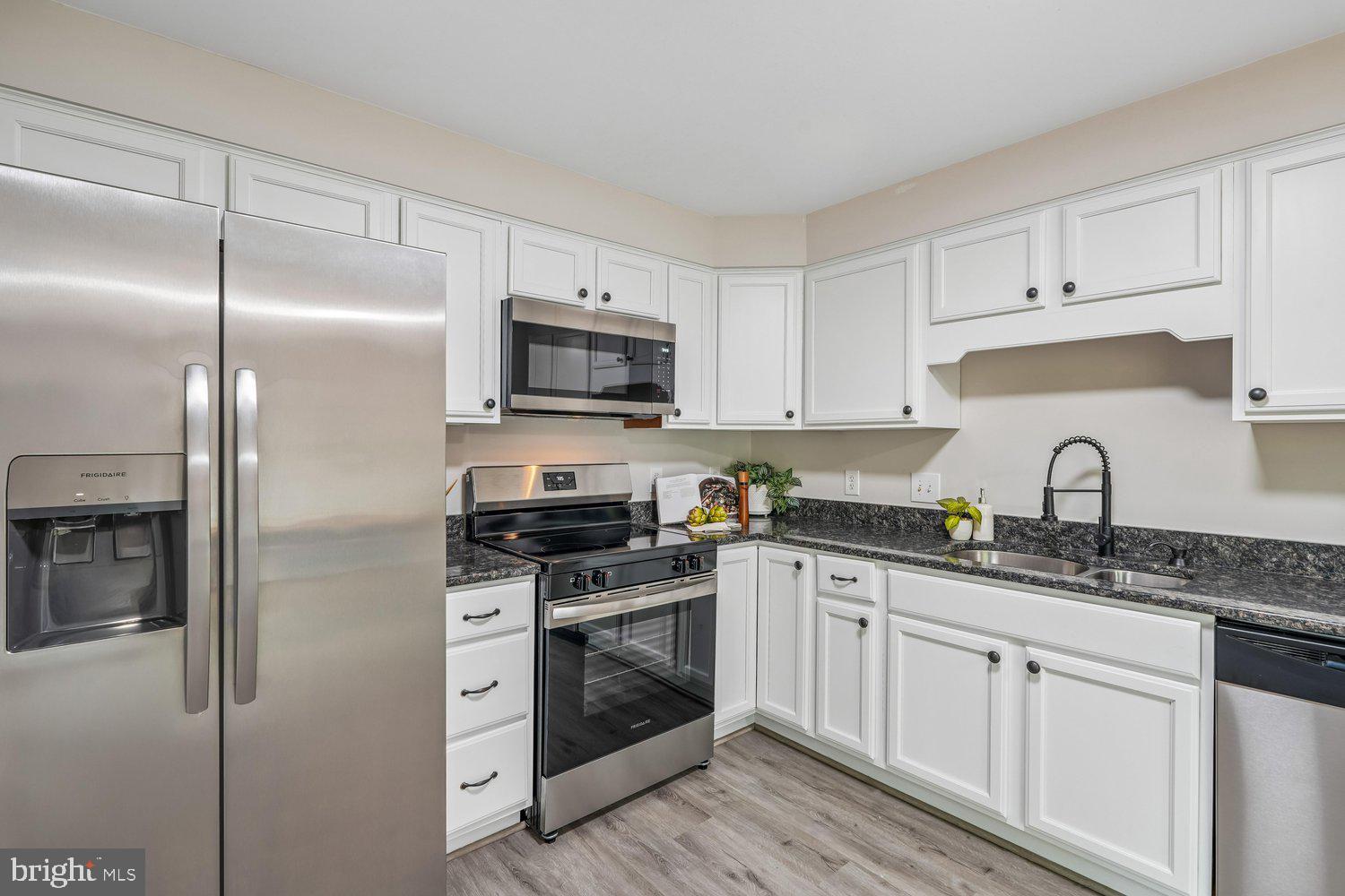 9955 Guilford Road Jessup, MD 20794 - Photo 7 of 45 Modern kitchen with sleek appliances.