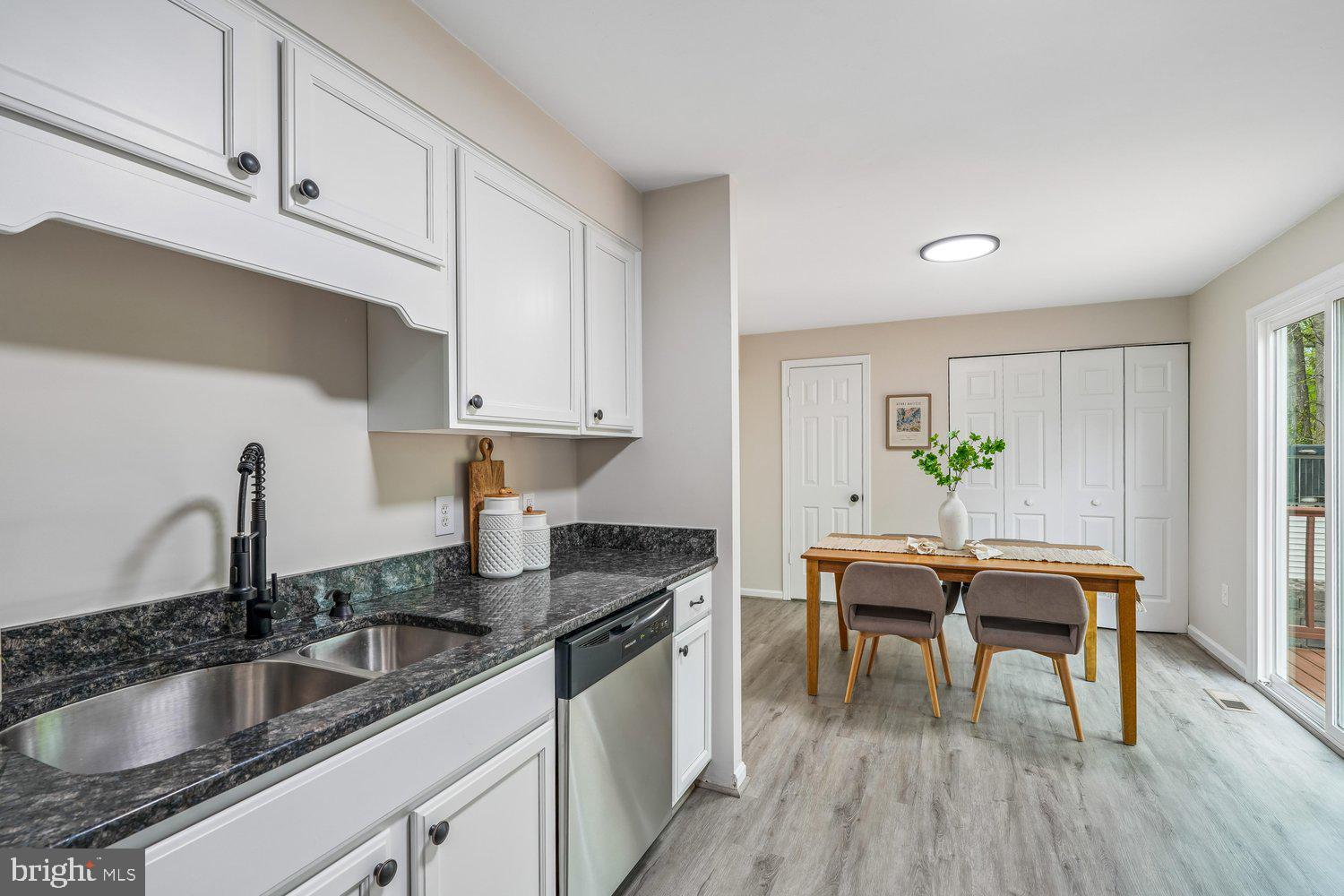 9955 Guilford Road Jessup, MD 20794 - Photo 8 of 45 Modern kitchen with inviting dining area.