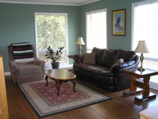 3015 Brentwood Road Raleigh, NC 27604 - Photo 3 of 12 a living room with furniture and a window