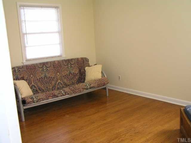 3015 Brentwood Road Raleigh, NC 27604 - Photo 7 of 12 a room with a bed and a window