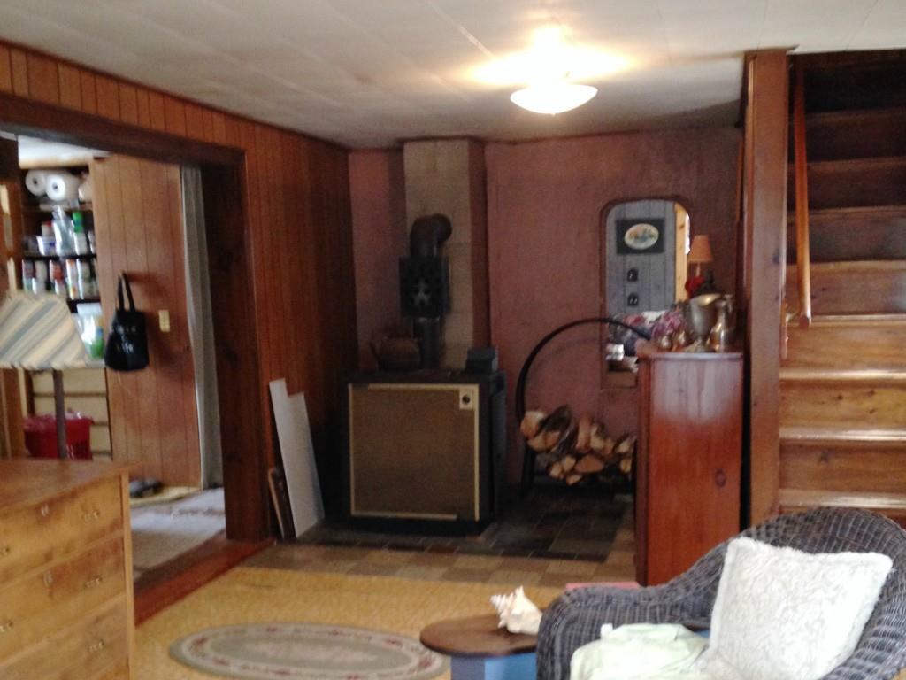 228 Alna Road Wiscasset, ME 04578 - Photo 12 of 30 This room has a wood stove also and...