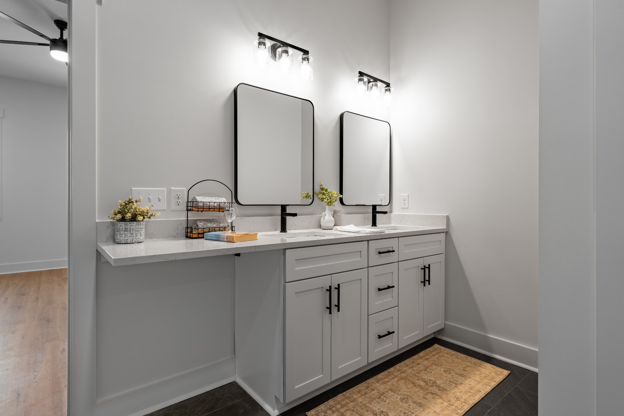 4031 Wells Road Springfield, TN 37172 - Photo 28 of 39 a bathroom with a double vanity sink and a mirror