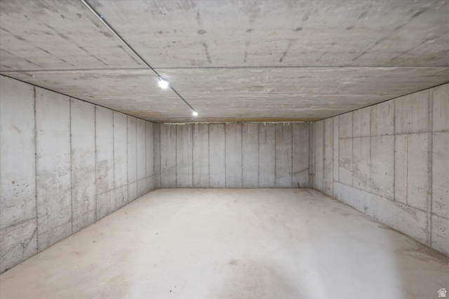 134 South Chamberlain Street Mapleton, UT 84664 - Photo 29 of 40 Suspended concrete slab underneath garage, concrete flooring, and ceiling-mounted track lighting