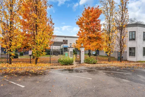 a view of road with a building in the background