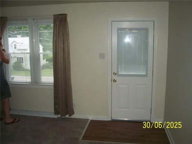 an empty room with windows