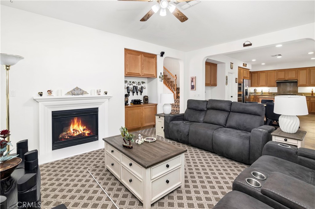 40494 Corrigan Place Temecula, CA 92591 - Photo 15 of 67 a living room with furniture and a fireplace