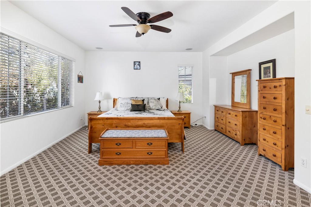 40494 Corrigan Place Temecula, CA 92591 - Photo 34 of 67 a bedroom with furniture and window