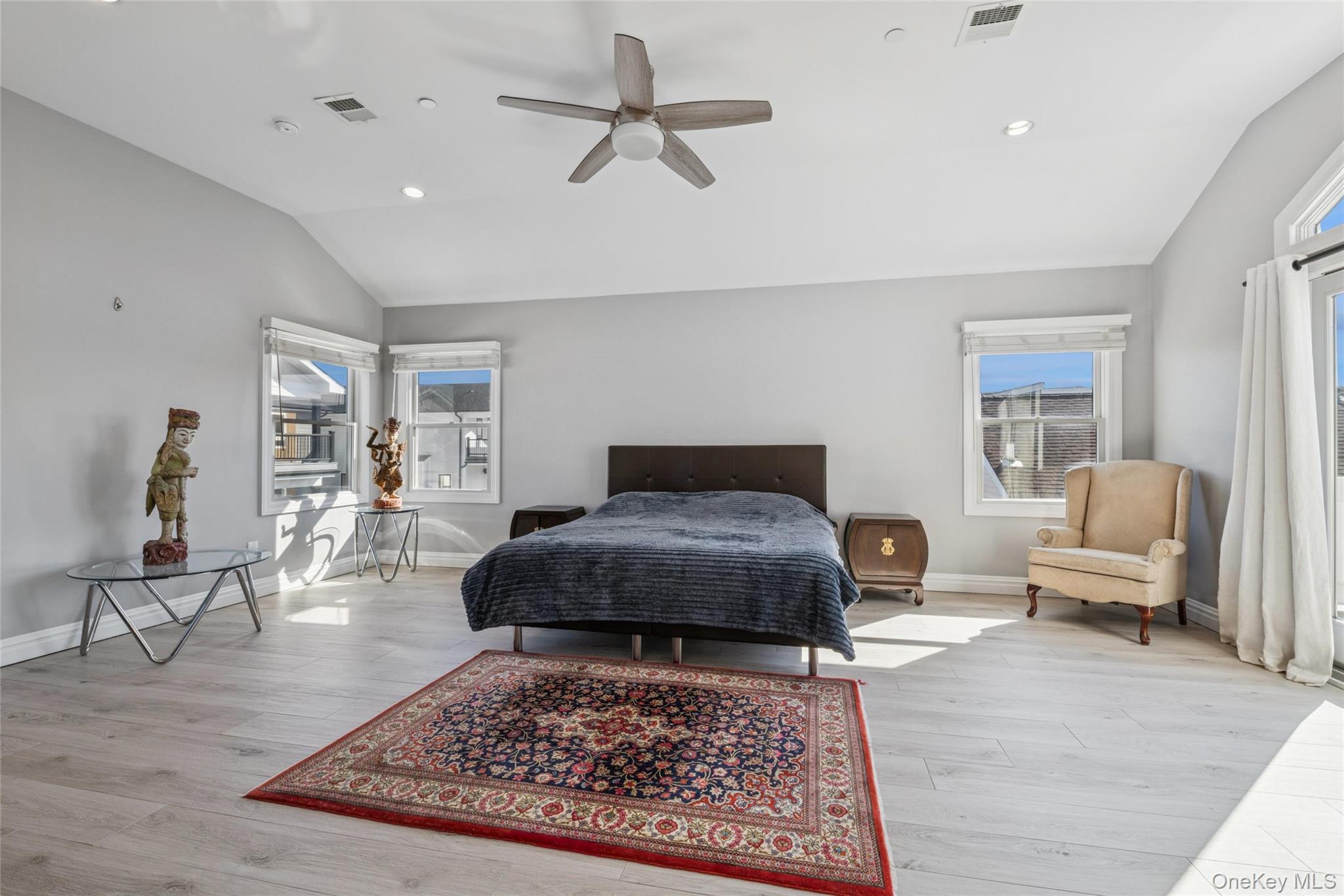 71 Michigan Street Long Beach, NY 11561 - Photo 20 of 48 a living room with furniture and a rug