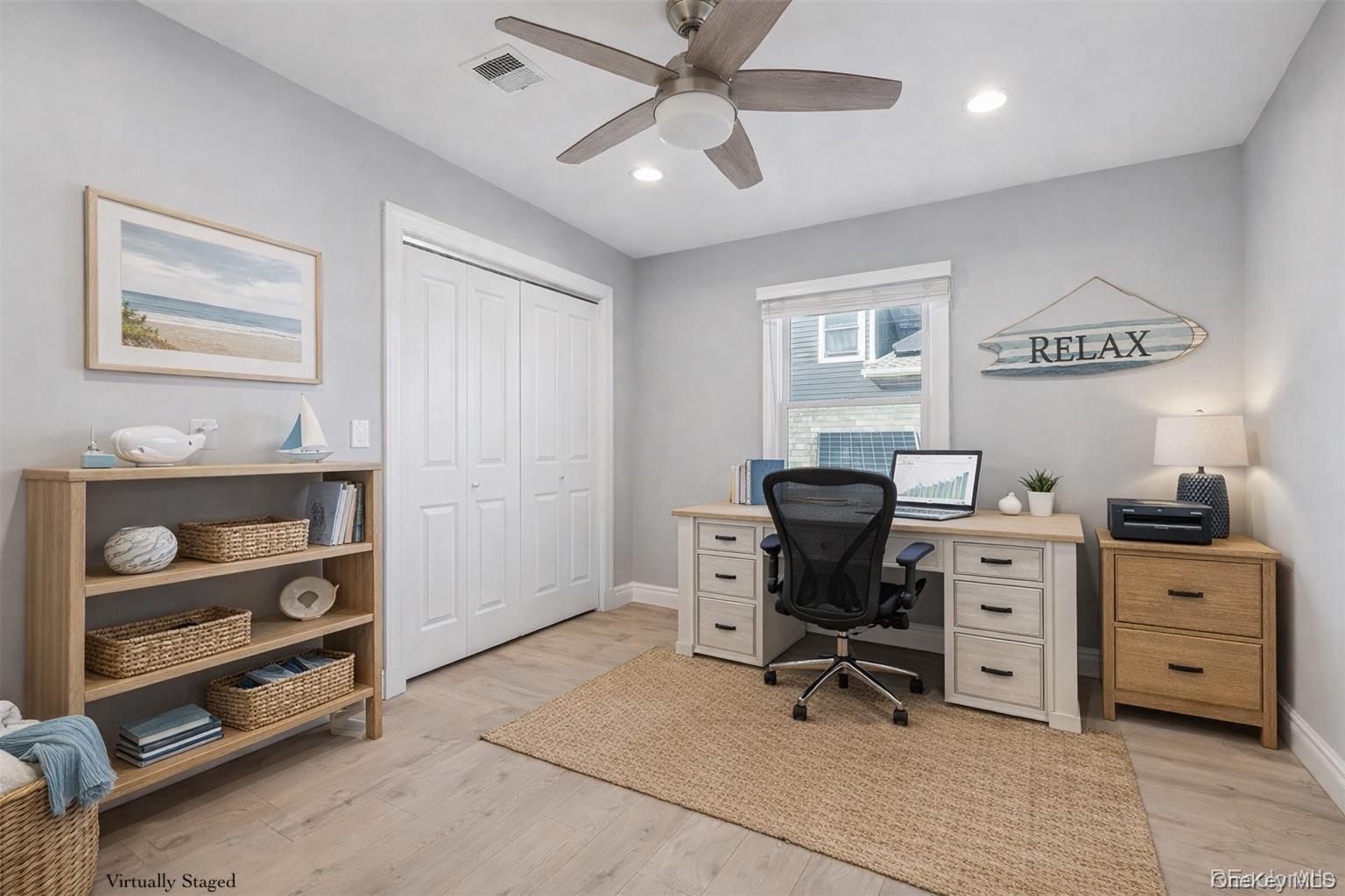 71 Michigan Street Long Beach, NY 11561 - Photo 28 of 48 a view of a workspace with furniture