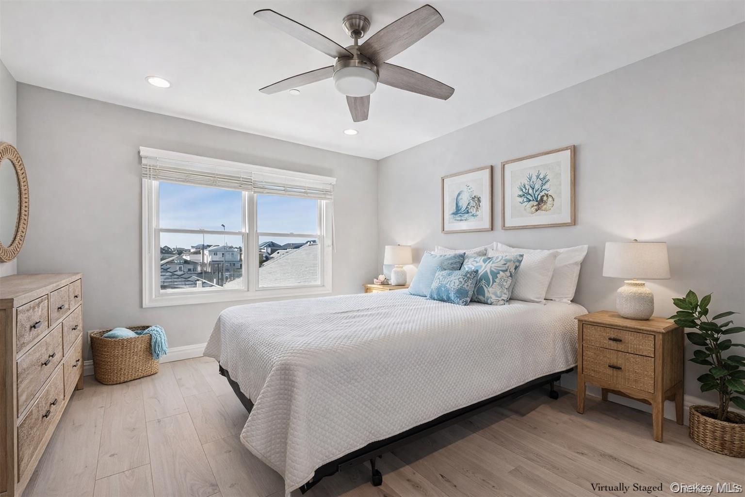 71 Michigan Street Long Beach, NY 11561 - Photo 30 of 48 a bedroom with a bed and a window