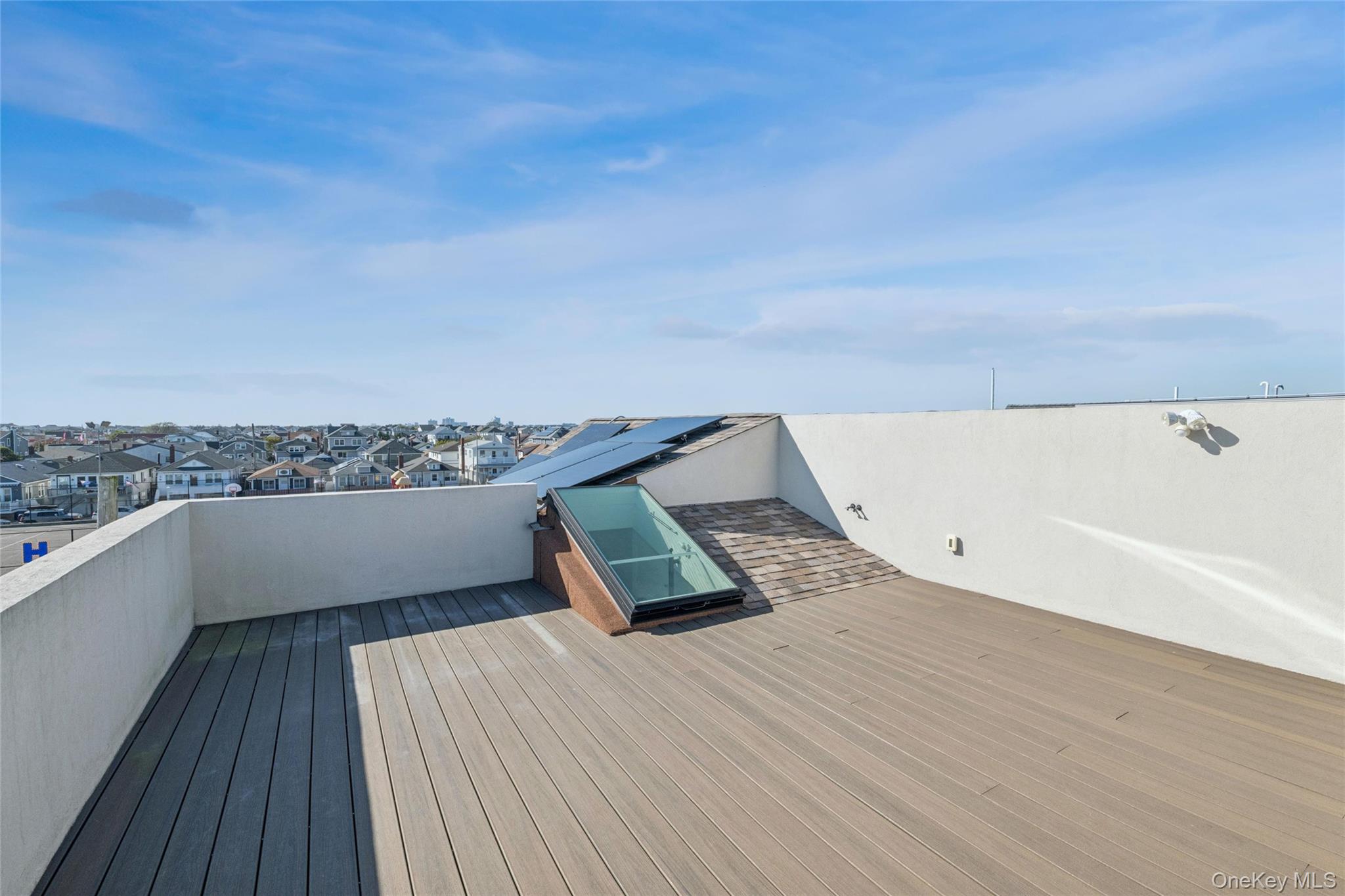 71 Michigan Street Long Beach, NY 11561 - Photo 45 of 48 a view of a terrace with sky view