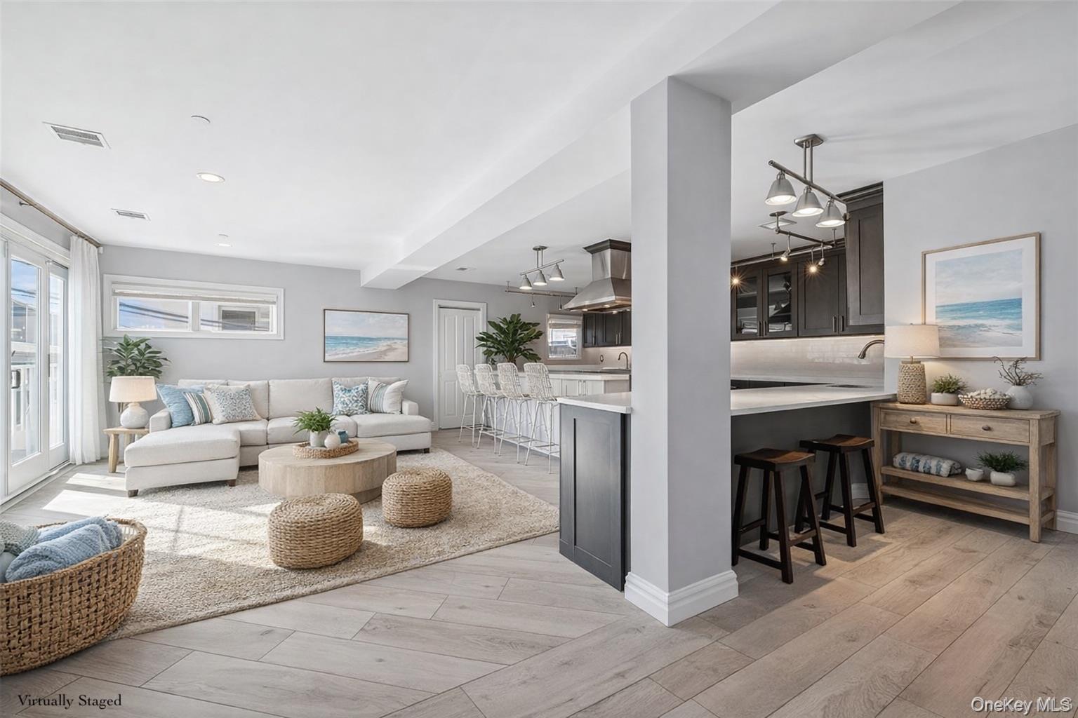 71 Michigan Street Long Beach, NY 11561 - Photo 6 of 48 a living room with furniture and wooden floor