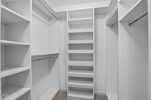 a view of an empty walk in closet