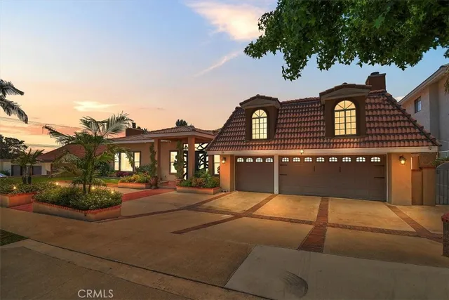 a front view of residential houses with yard