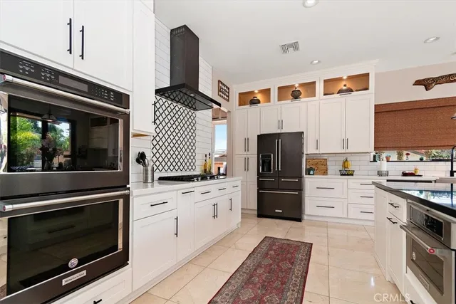 a bed room with a bed and a large mirror