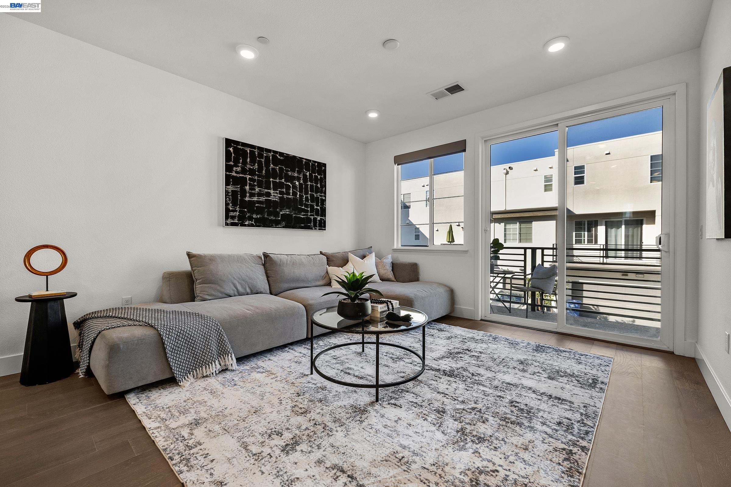 29259 Hub Court Hayward, CA 94544 - Photo 10 of 34 a living room with furniture a rug and a large window