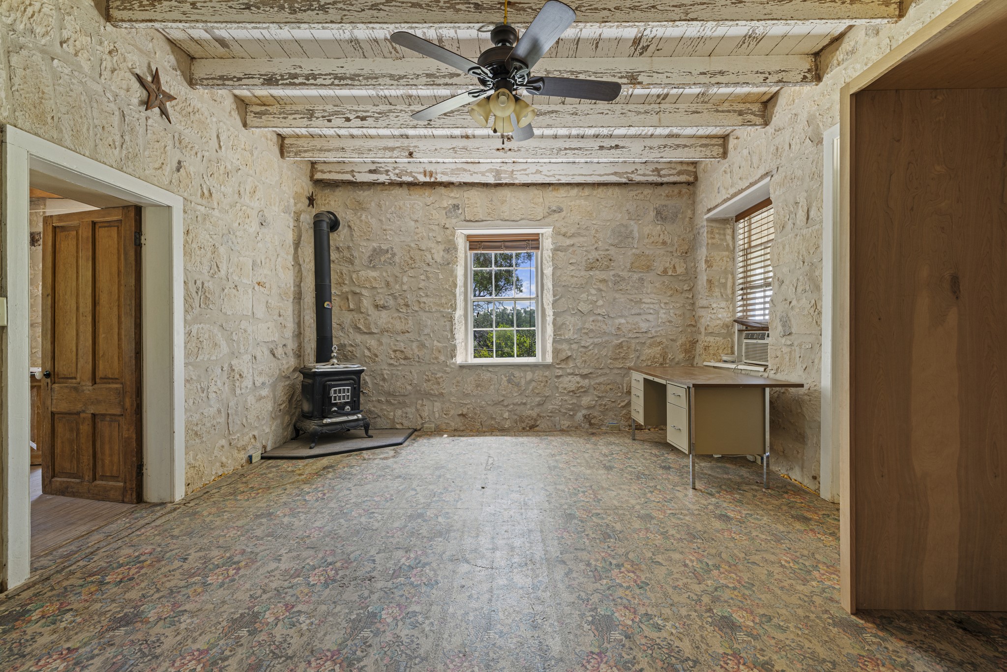1825 Onion Creek Road Doss, TX 78618 - Photo 30 of 40 a view of an empty room with a window