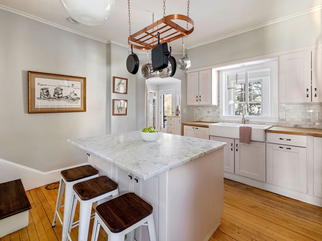 4 Latisquama Road Southborough, MA 01772 - Photo 21 of 42 a kitchen with stainless steel appliances granite countertop a stove a sink and a refrigerator