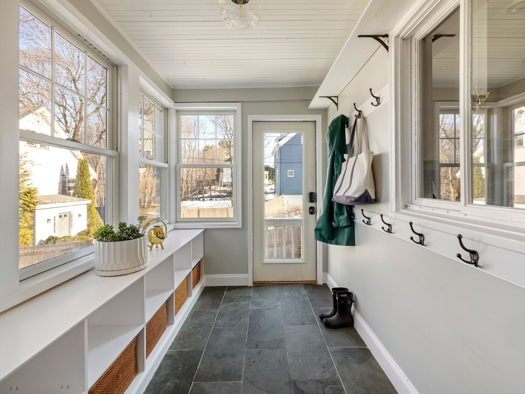 4 Latisquama Road Southborough, MA 01772 - Photo 25 of 42 a bathroom with a tub a window and mirror