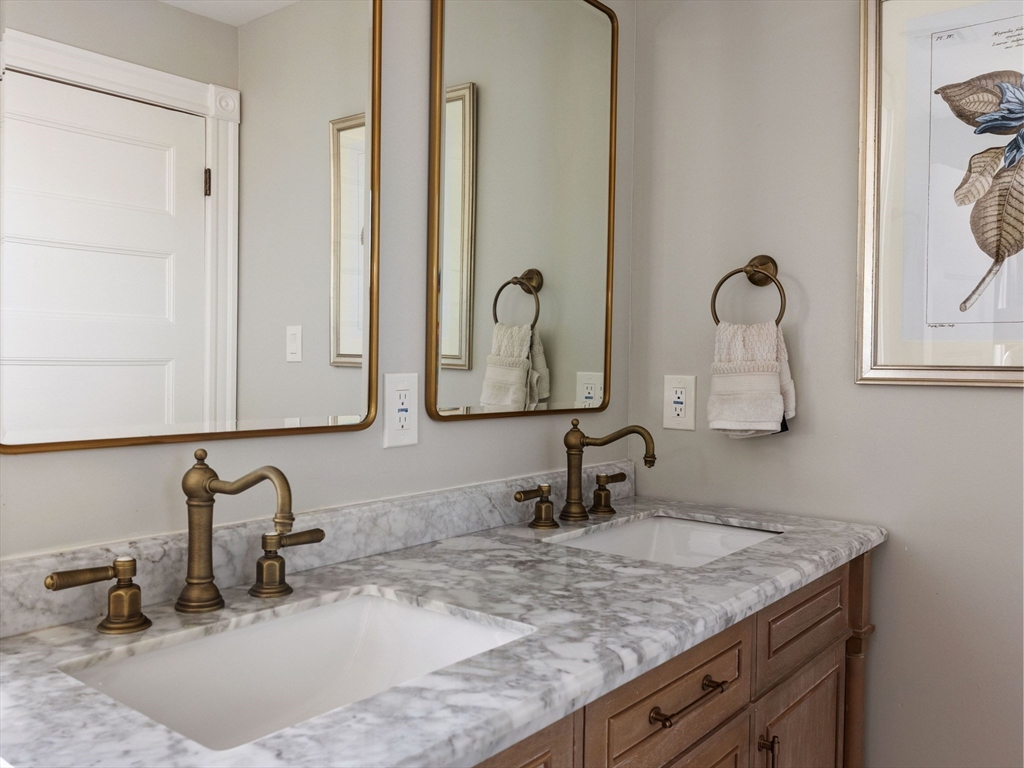 4 Latisquama Road Southborough, MA 01772 - Photo 29 of 42 a bathroom with a sink and a mirror