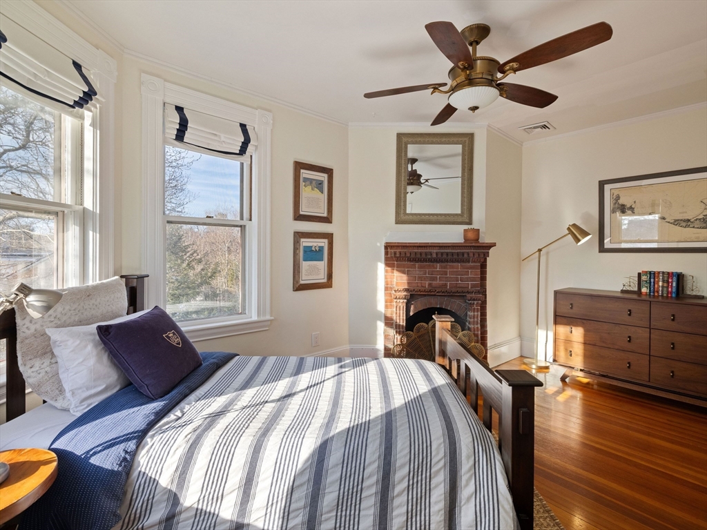 4 Latisquama Road Southborough, MA 01772 - Photo 31 of 42 a spacious bedroom with a bed and a fireplace