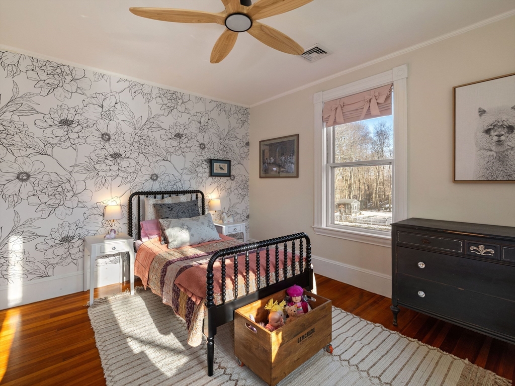 4 Latisquama Road Southborough, MA 01772 - Photo 32 of 42 a bed room with a bed window and a couch