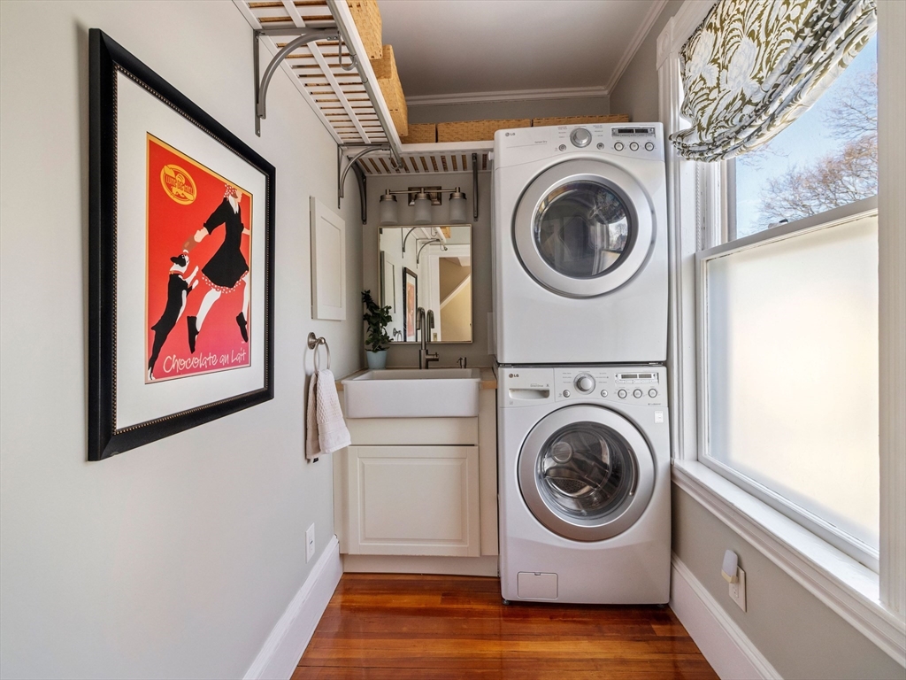 4 Latisquama Road Southborough, MA 01772 - Photo 34 of 42 a view of a hallway with washer and dryer