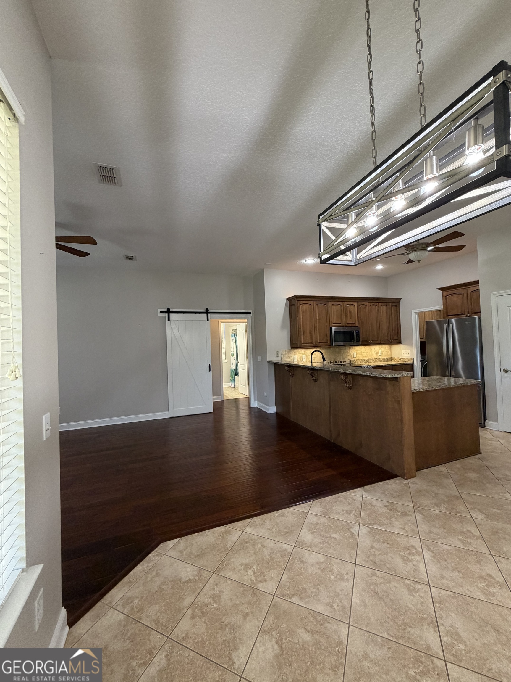 108 Heron's Nest Circle Kingsland, GA 31548 - Photo 13 of 62 a view of a kitchen with a sink