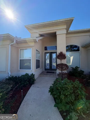 a house view with a garden space