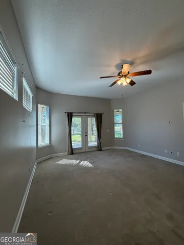 a view of a room with racks on the wall