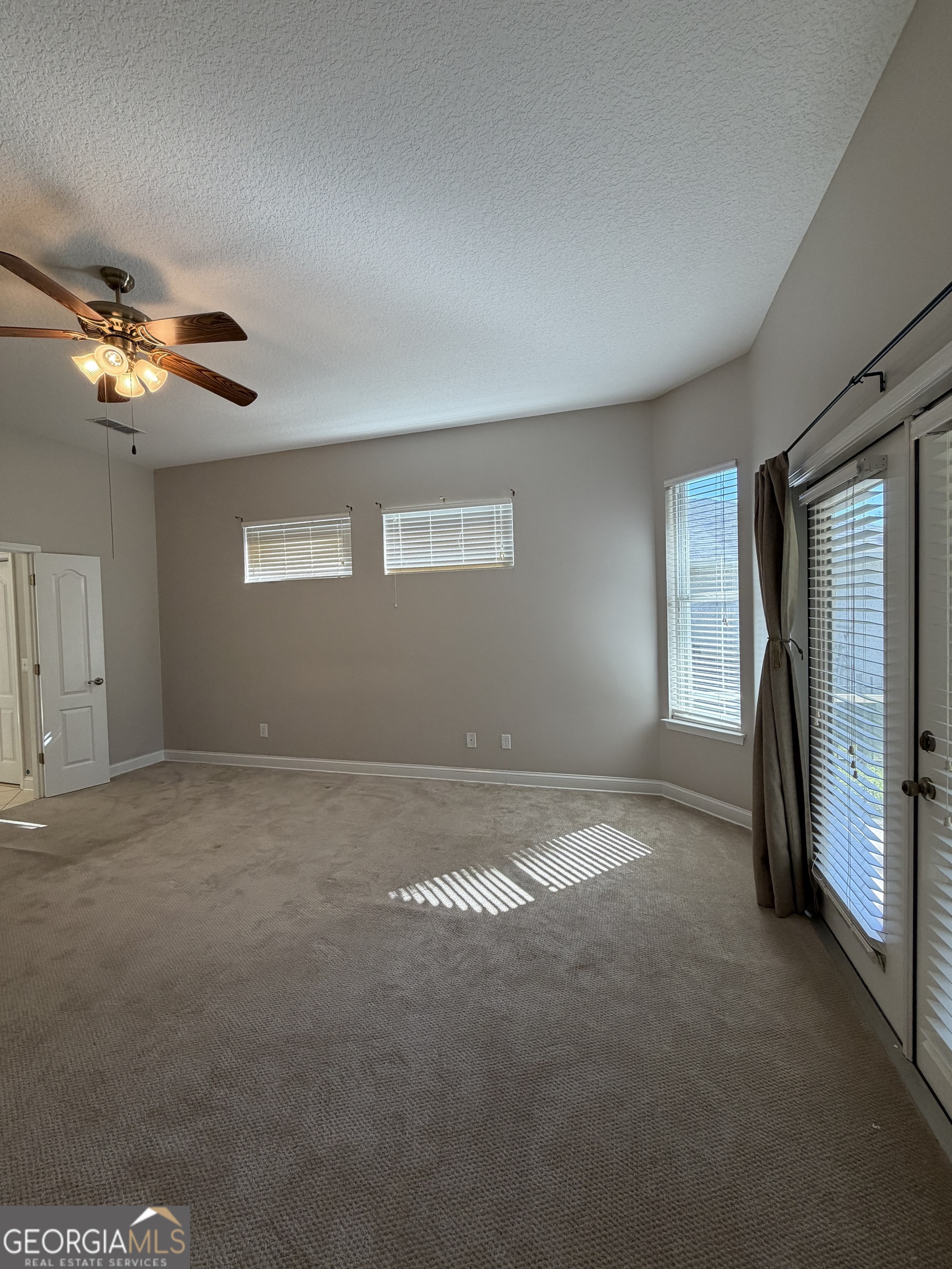 108 Heron's Nest Circle Kingsland, GA 31548 - Photo 30 of 62 a view of empty room with ceiling fan