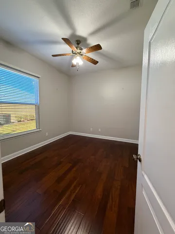 a utility room with cabinets