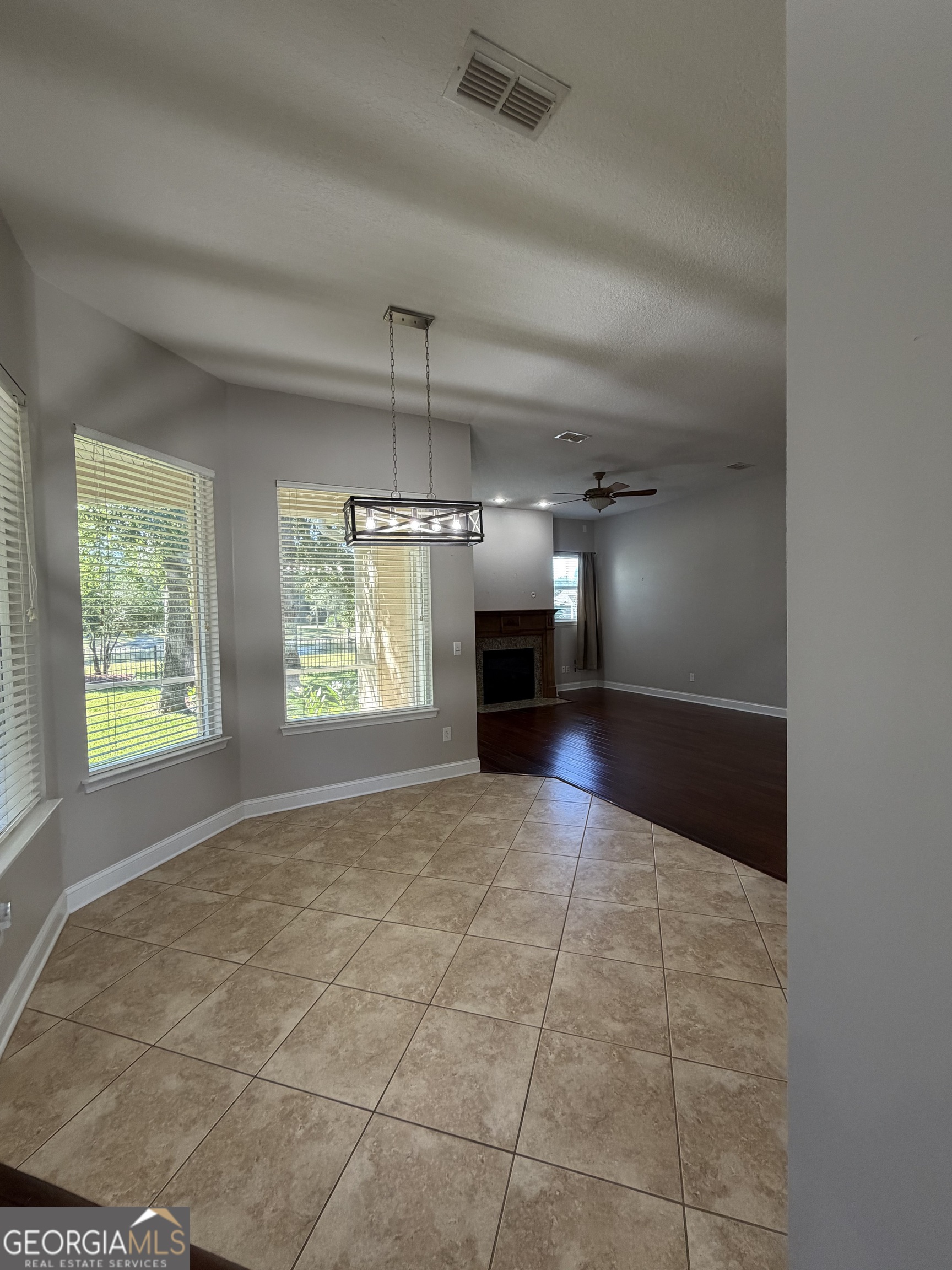 108 Heron's Nest Circle Kingsland, GA 31548 - Photo 8 of 62 a view of an empty room and window