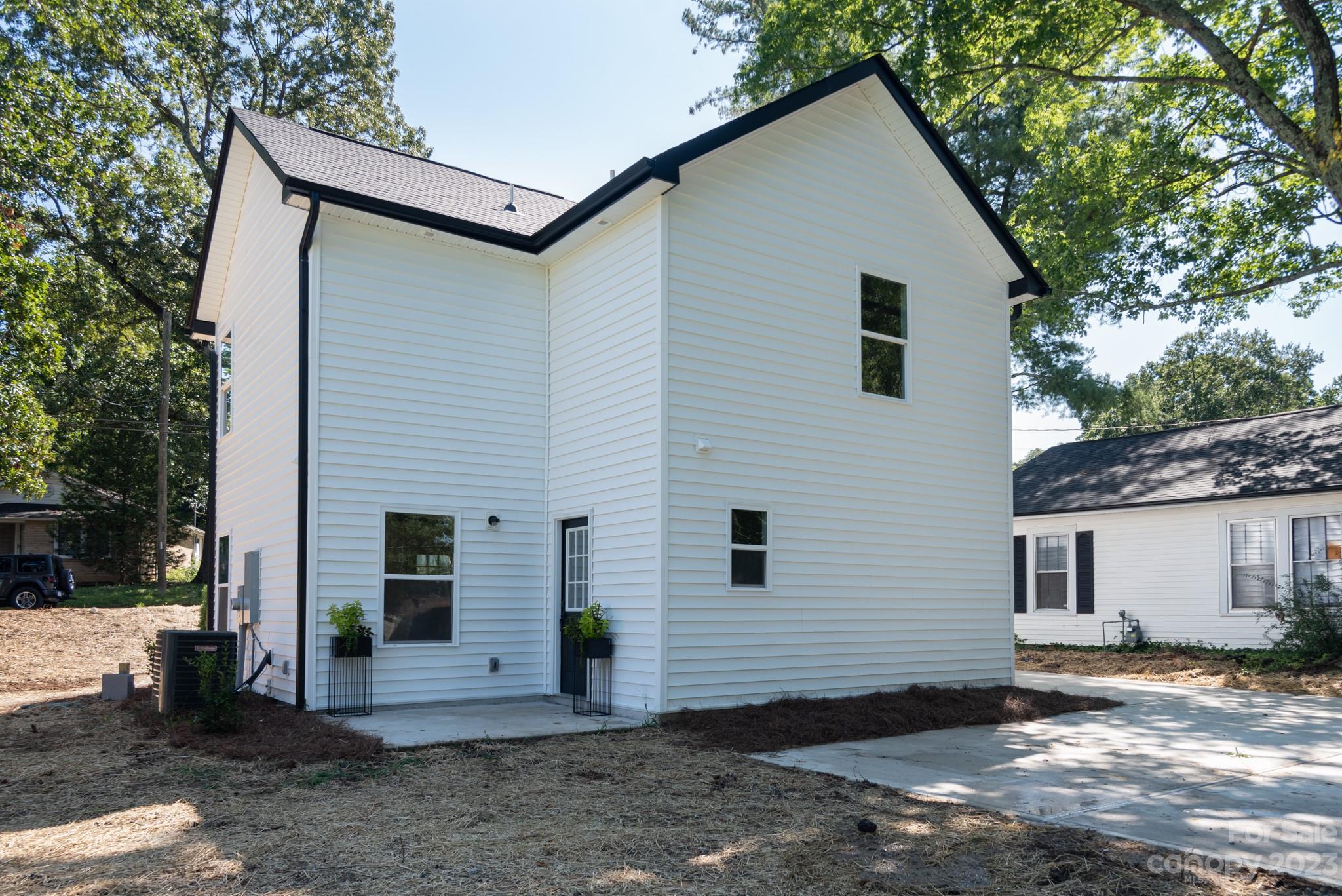 693 Gibson Drive Northwest Concord, NC 28025 - Photo 12 of 12 a view of a house with a yard