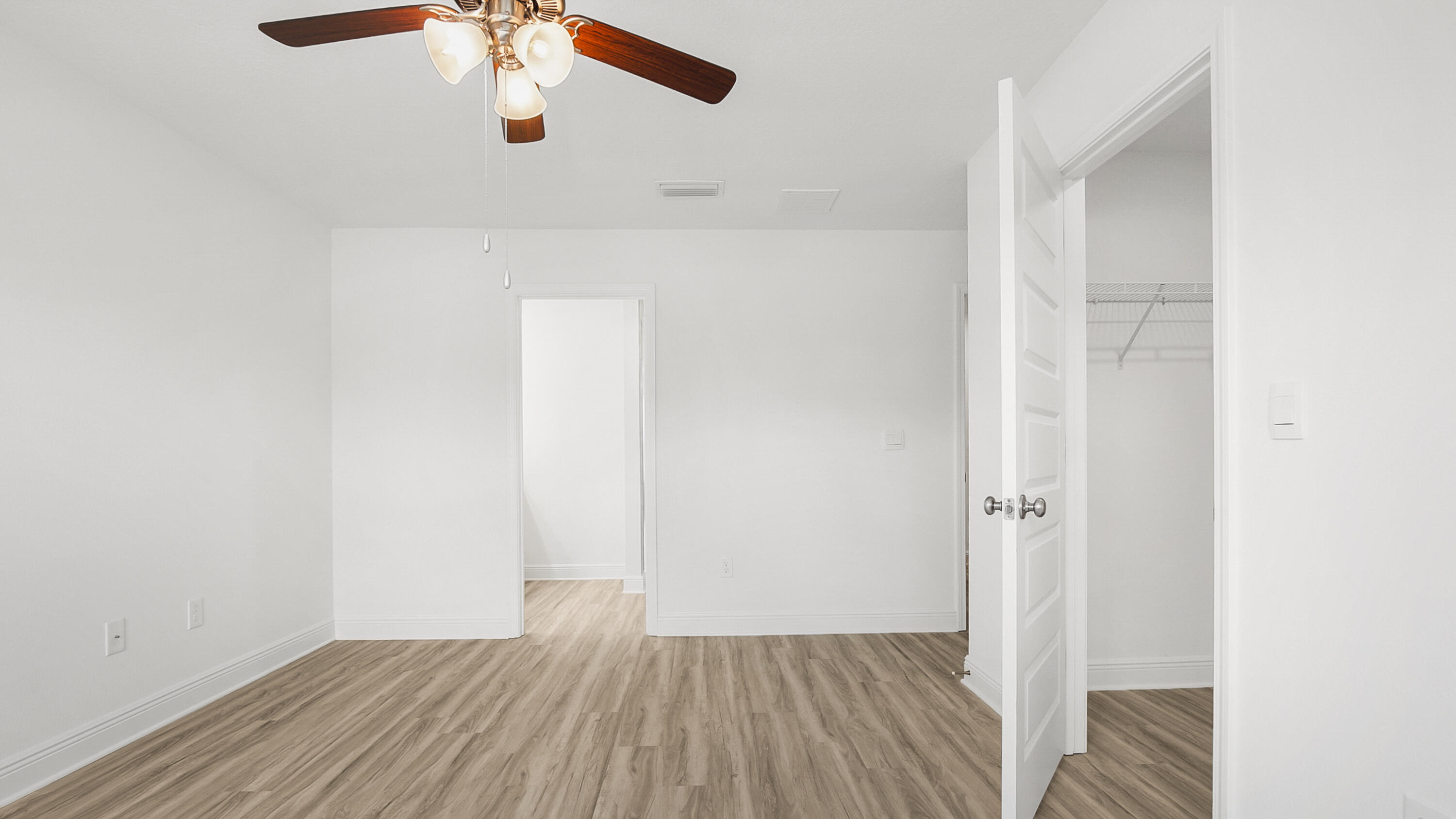 64 Phoenix Street Santa Rosa Beach, FL 32459 - Photo 20 of 34 a view of a room with wooden floor