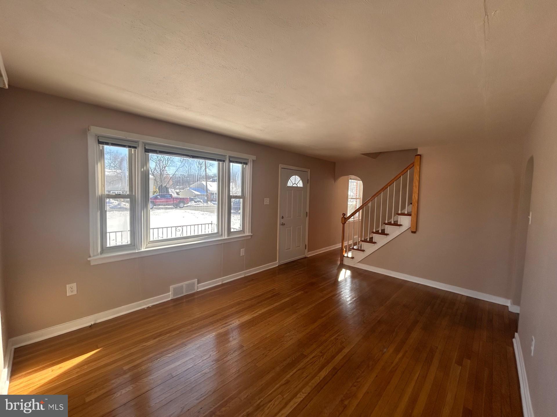 340 Edgewood Road York, PA 17402 - Photo 2 of 14 a view of empty room with wooden floor and fan