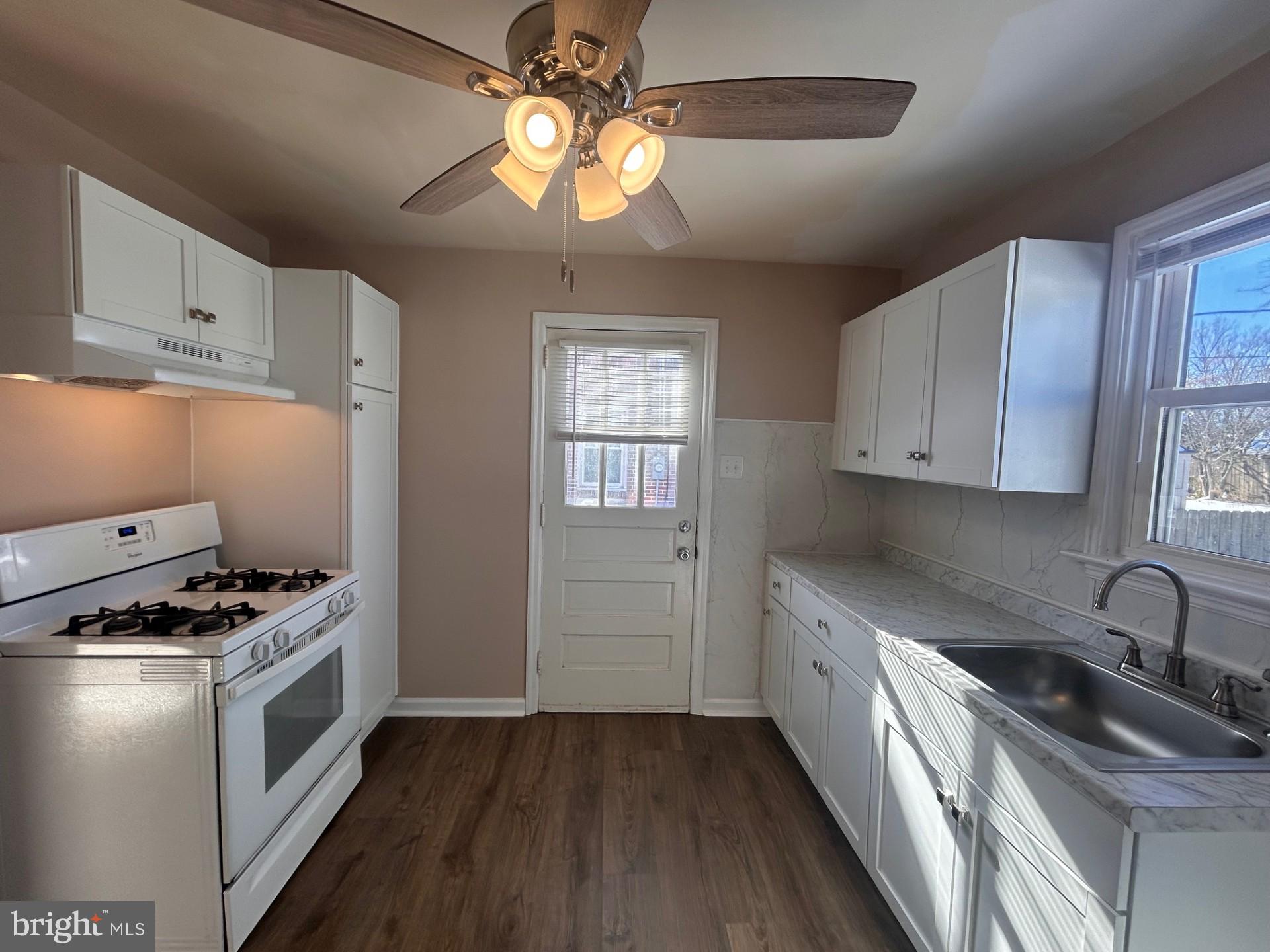 340 Edgewood Road York, PA 17402 - Photo 6 of 14 a kitchen with granite countertop a sink stainless steel appliances and cabinets