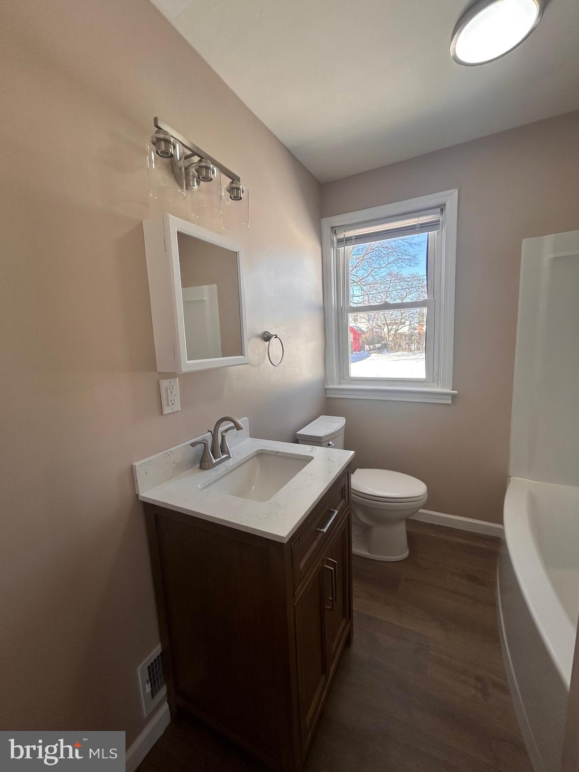340 Edgewood Road York, PA 17402 - Photo 7 of 14 a bathroom with a toilet sink and mirror