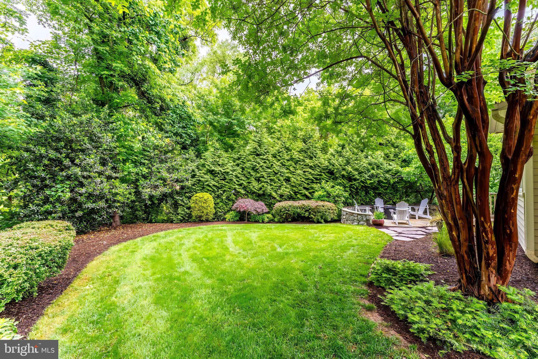 1655 Hunting Ridge Court McLean, VA 22101 - Photo 17 of 38 a view of a backyard with a garden