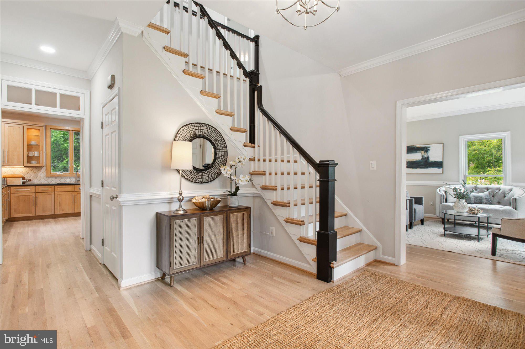 1655 Hunting Ridge Court McLean, VA 22101 - Photo 2 of 38 a view of a livingroom with furniture and staircase