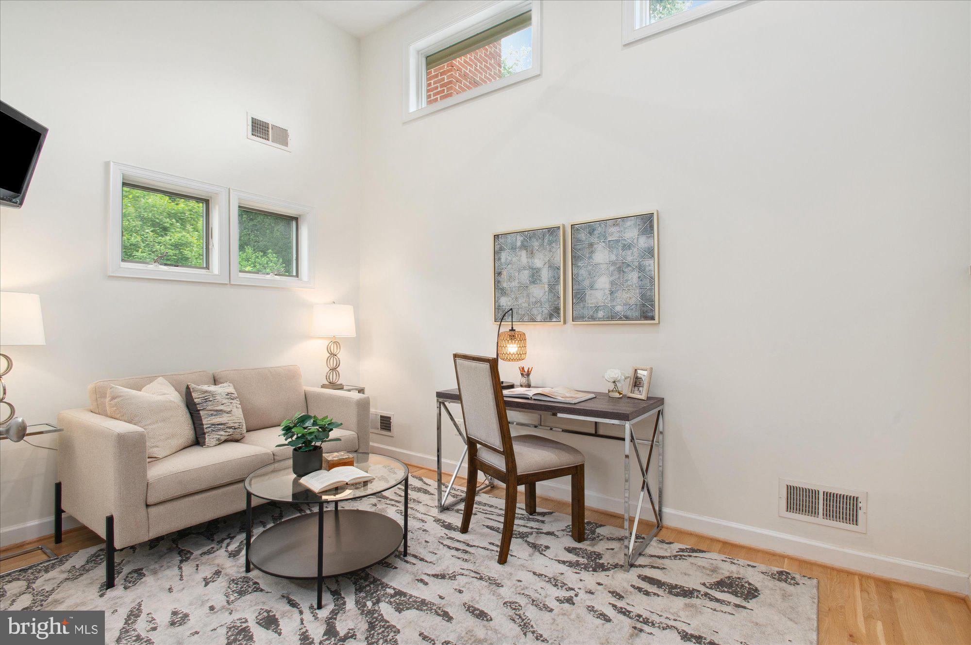 1655 Hunting Ridge Court McLean, VA 22101 - Photo 23 of 38 a living room with furniture and a wooden floor