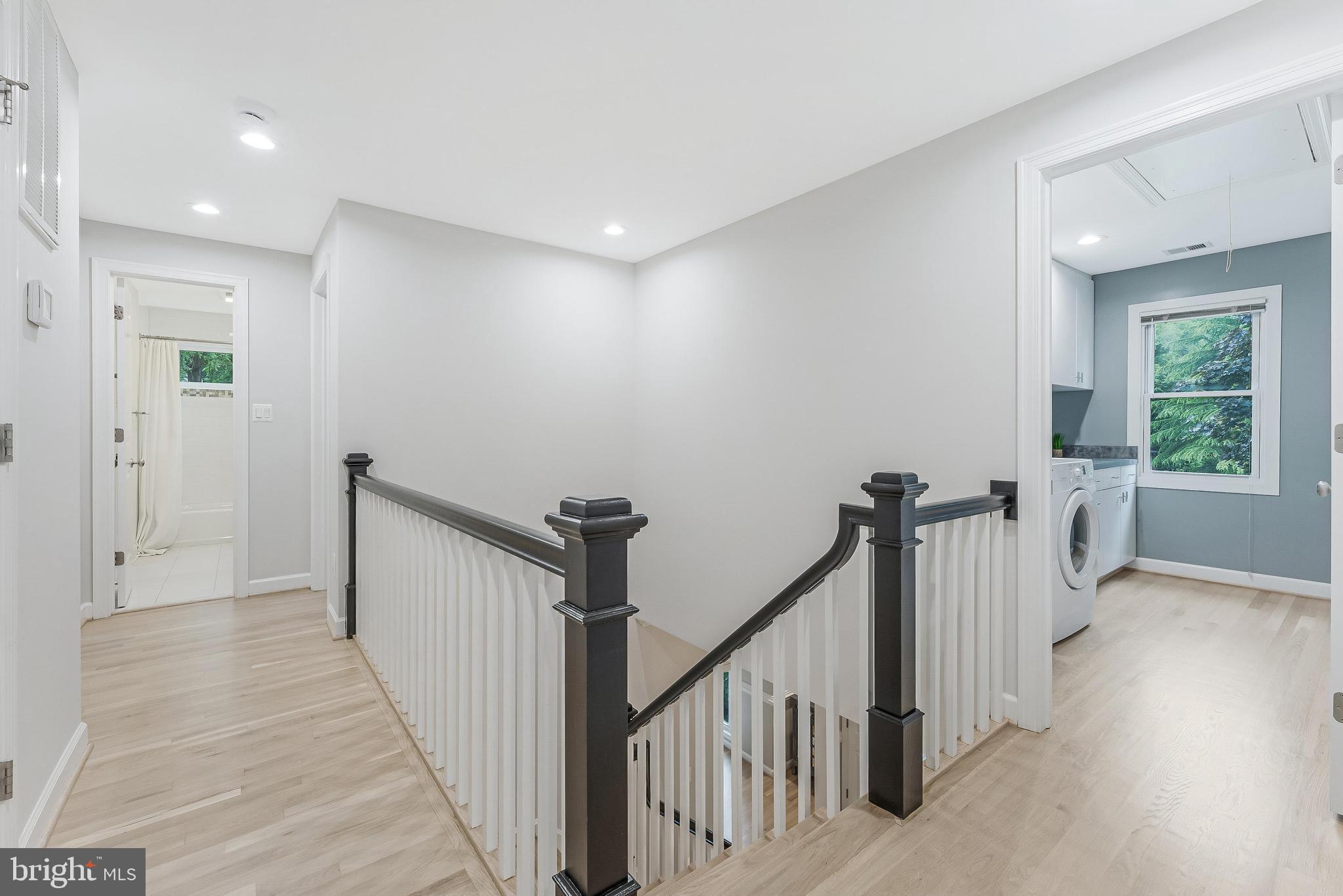 1655 Hunting Ridge Court McLean, VA 22101 - Photo 26 of 38 a view of a hallway with a window